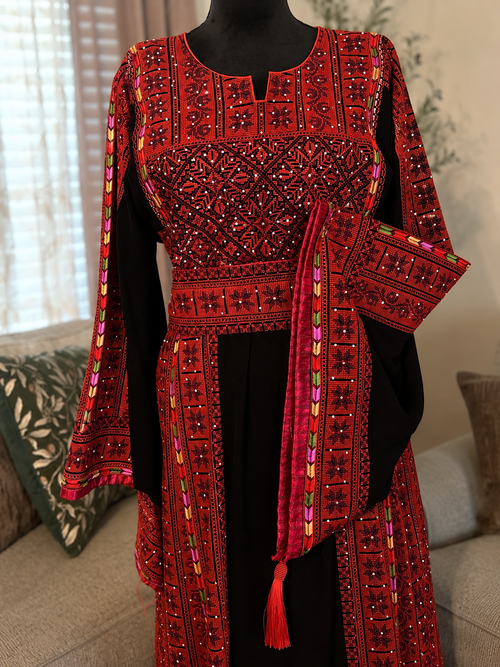 Authentic Palestinian embroidered dress with stunning traditional detailing and elegant patterns.  
Worn only once and in excellent condition — no flaws or defects.  

Original price: $350