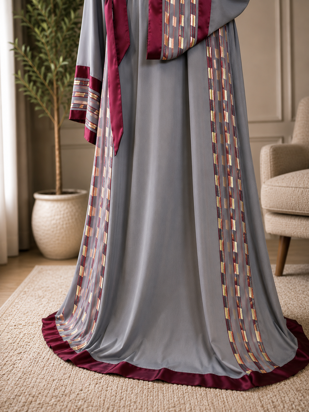 Elegant gray embroidered dress with burgundy satin details.  
Worn only once and in excellent condition — no flaws or defects.  

Original price: $180  
Size: 3