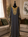 Navy blue kaftan with luxurious gold embroidery and embellishments. ✨